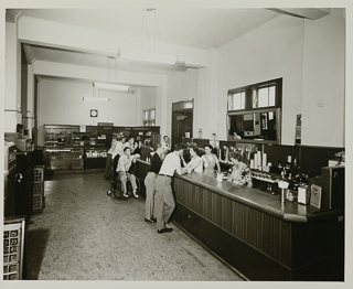 People inside the soda fountain in de La Salle, 1950