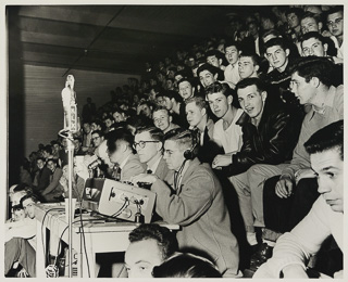 Broadcasters from KLX and fans at a Saint Mary&#39;s versus San Jose State University basketball game at the Saint Mary&#39;s Gymnasium, February 15, 1950