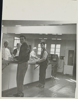 Students being served food at the cafeteria in Oliver Hall, 1950