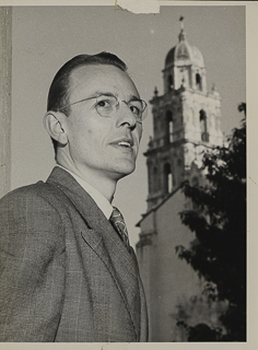 Portrait of Yale Meyers with chapel in the background, 1950