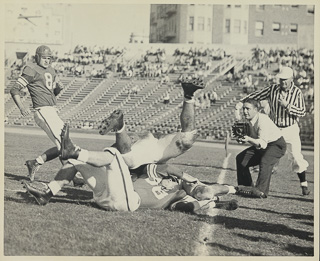 Player Bob Hagler (#8, halfback) of Saint Mary&#39;s College in a play during a football game against University of Nevada, October 17, 1948