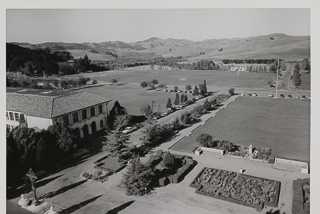 View northwest from Chapel tower with railroad station in the distance, 1950