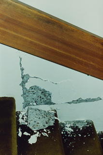 Spalling concrete resulting from torquing of the Saint Albert Hall Library stairwells following the Loma Prieta earthquake, 1989