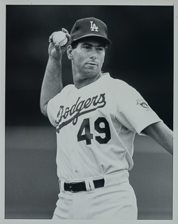 Tom Candiotti, Saint Mary&#39;s College alumnus and baseball player, pitching in a Los Angeles Dodgers uniform, 1992