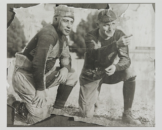 Edward P. &quot;Slip&quot; Madigan and fullback Black kneeling, 1922