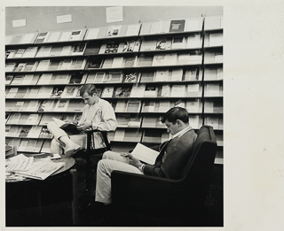 Students browsing periodicals in the Saint Albert Hall Library, c1975