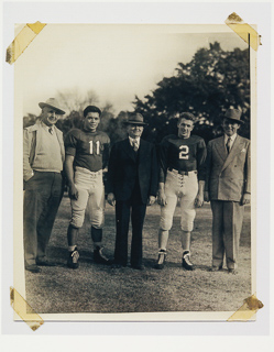 Herman John Wedemeyer running with the ball during a football game, 1946