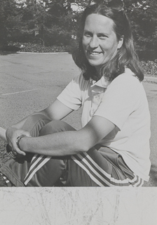 Counseling Director Sheri Richards in conversation with staff, May 1990