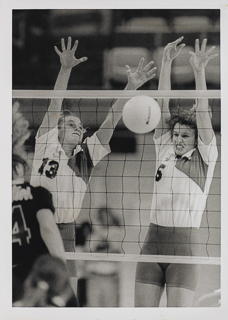 Two students from the women&#39;s volleyball team during a game, 1985 - 1990