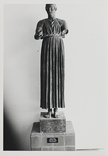 The statue of a Charioteer on the balcony of the Saint Albert Hall Library, 1980