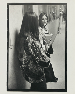 Two students convsersing in Dante Hall, 1970