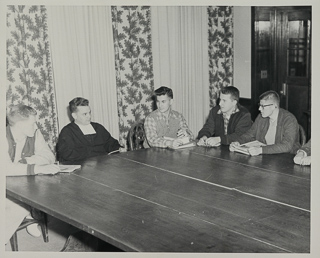 Student-Faculty board members sitting at a table, 1950