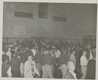 The crowd at a Saint Mary&#39;s versus Santa Clara basketball game, February 15, 1957