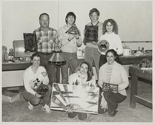 Students from Brother Gabriel Murphy&#39;s stained glass class posing with their projects, January 1982