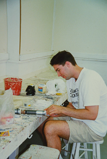 Student working on an art project, 1990