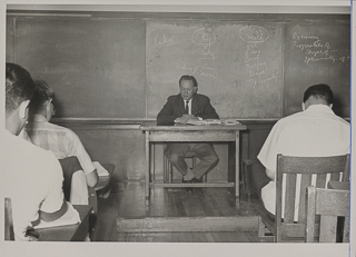 Professor of Economics William Tauchar in class, 1970