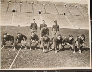 Saint Mary&#39;s College Varsity Football team posing on a football field, 1924