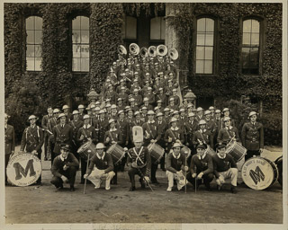 Band Director Joe McTigue and Saint Mary&#39;s College Band posing with their instruments, 1932