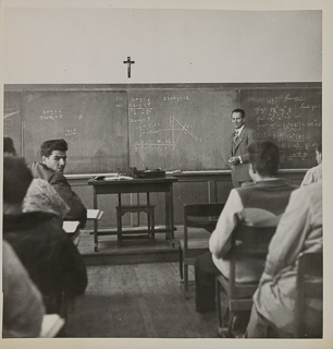 A professor and students during a math class, 1950