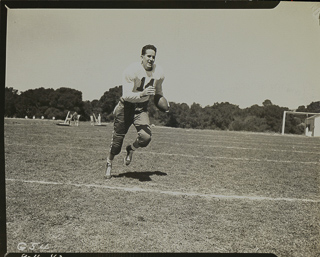 Tom Coll on the football field, September 11, 1942