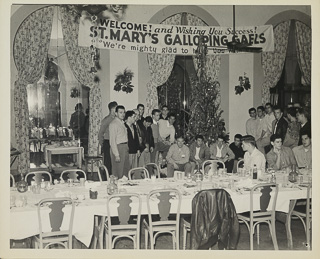 Football team photo taken after the celebration dinner before Sugar Bowl game, 1945