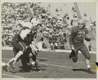 Players during a football game, 1942