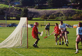 The Saint Mary&#39;s College women&#39;s lacrosse team playing against an unknown team, 1995