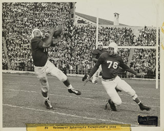 Herman John Wedemeyer intercepting a pass during a football game, 1946