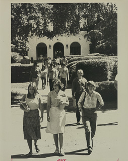 Students crossing Chapel Green with Galileo Hall in the background, 1975