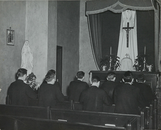 Student Brothers praying in Benilde Hall Chapel, undated