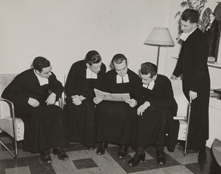 Student Brothers reading a newspaper, 1955