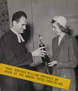 Brother William presents award to student at Western Catholic High Schools Press Convention, 1949