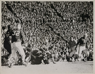 Tackle during a Saint Mary&#39;s College football game against an unidentified team, undated