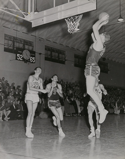 William Sanchez of Saint Mary&#39;s College playing in a basketball game against Loyola, 1950