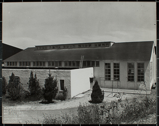 Exterior view of indoor swimming pool, May 19, 1943